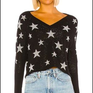Chaser sweater. Size small. Black/silver stars.